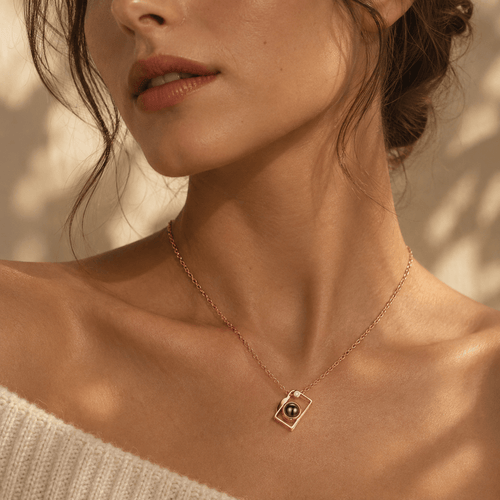 Woman wearing a camera photo projection necklace