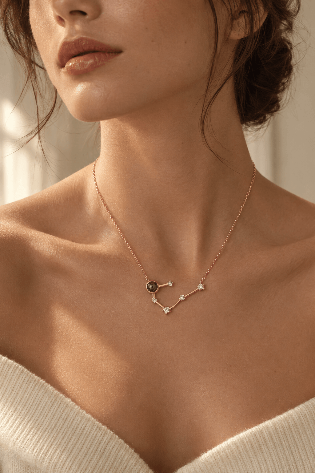 Woman wearing a constellation photo projection necklace