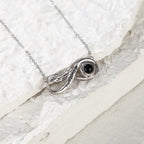 nfinity Love Photo Projection Necklace showing personalized photo projection