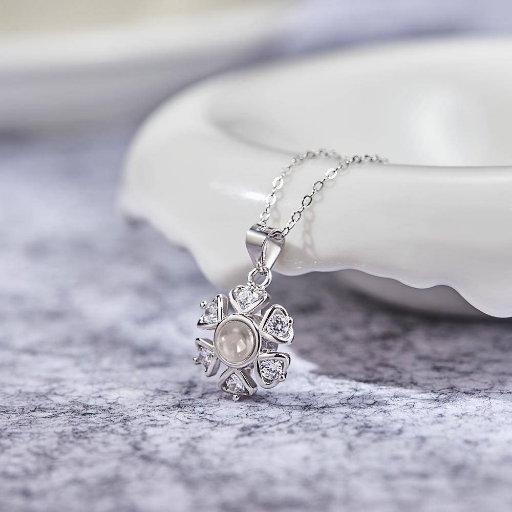 Close-up of flower photo projection necklace pendant